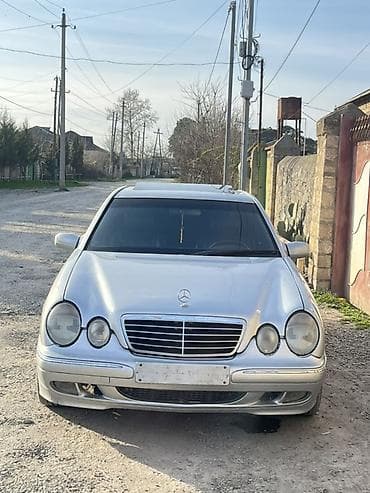 xrom disk: Mercedes-Benz E 320: 3.2 l | 2000 il Sedan — 3