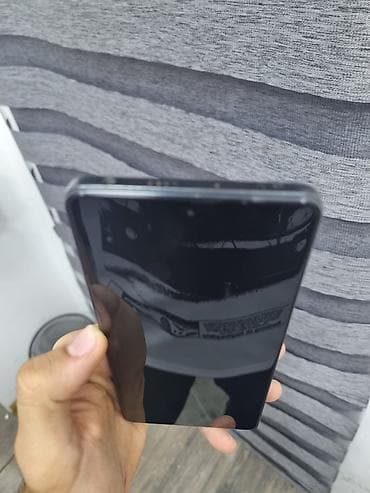 poco c75: Poco X5 Pro 5G, 256 GB, rəng - Qara, Face ID — 4