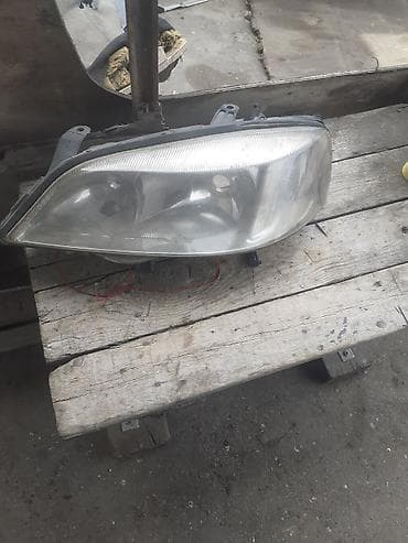 audi oturacaqlar: Sol, Yaxın və uzaq vuran işıqlar Opel, 1999 il, Orijinal, İşlənmiş — 2