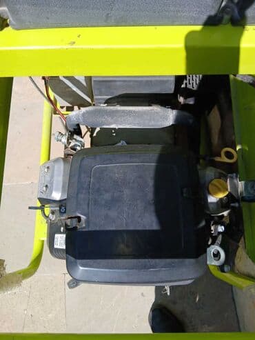 стабилизатор напряжения для дома: GenPower GBS 100 ME benzin generatoru, sarı rəngdə, daşıma üçün — 5