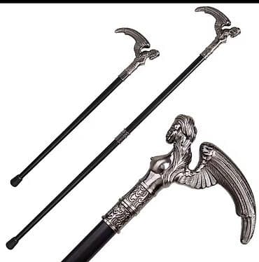 Ходунки, костыли, трости, роллаторы: Qara rəngli, gümüşü rəngli qulp ilə bəzədilmiş əsa. Əsanın qulpu qadın — 1