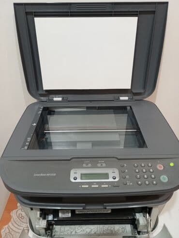 asus zenfone 10 qiymeti: Canon LaserBase MF3228 3-ü birində printer. Üzərində işlək katric — 2