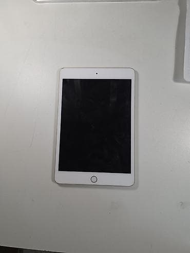tablet sat: Apple iPad – qızılı rəng Xüsusiyyətlər: - 7.9" Retina ekran (ağ ön — 4