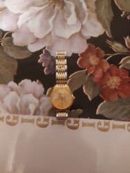 красивые платья на прокат в баку: İkirəngli klassik qol saatı - Korpus: qızılı tonlu dairəvi korpus — 1