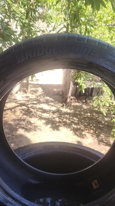 teker dolduran: İşlənmiş Şin Bridgestone 245 / 45 / R 19 — 4