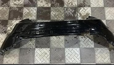 Ehtiyat hissələri: Məhsul: Arxa bamper (orijinal plastik) Rəng: Qara (parlaq) Material — 3