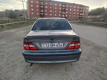 opel astra c: Sedan avtomobil – boz rəng - 4 qapı, 5 yerlik - Ön və arxa optikalar — 3