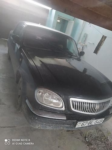 opel 1.5 dizel motor: GAZ-3110 Volga sedan - Kuzov: 4 qapılı sedan, qara rəng - Ön hissə — 2