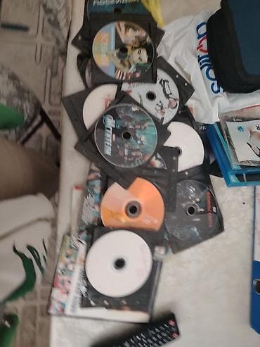 dvd disklər: 50 yaxin disk var rusca kinolar 3manatdan satilir — 2