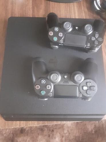 PlayStation 4 Slim oyun seti Paket tərkibi: - PS4 Slim konsolu (qara) lalafo.az -da PlayStation 4 Slim oyun seti Paket tərkibi: - PS4 Slim konsolu (qara)