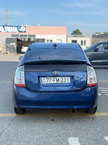 prius salon: Toyota Prius (ikinci nəsil) hibrid hetçbek Xüsusiyyətlər: - Kuzov: 5 — 7