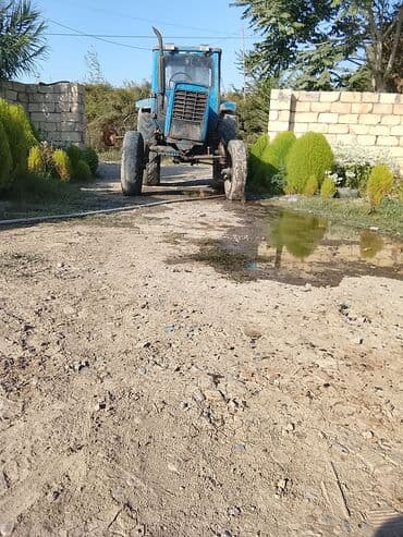 disklər r14: Mavi rəngli təkərli traktor. Texniki xüsusiyyətlər və quruluş: - Ön — 3