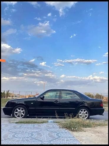 Продажа авто: Mercedes-Benz E-Class (W210) sedan - Kuzov: 4 qapılı sedan, qara rəng — 4