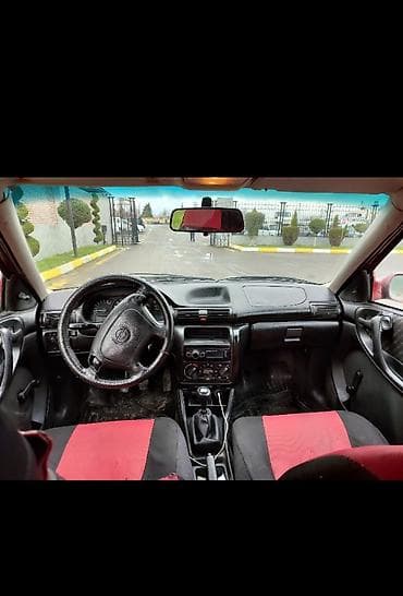 şkoda: Opel Astra: 1.6 l | 1997 il 15465 km Universal — 2