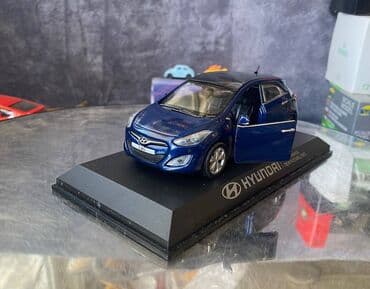 metbex tavan modelleri: Коллекционная модель Hyundai i30 5 door blue 2012 Pino B&D Scale — 23