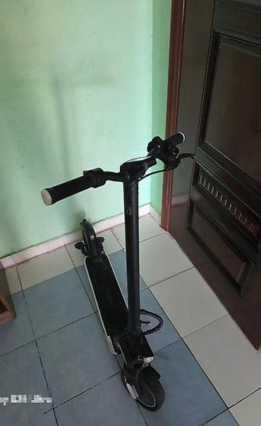 Elektrikli skuter – qara rəng pavorotniki qabag isiq tormuz tekerler lalafo.az -da Elektrikli skuter – qara rəng pavorotniki qabag isiq tormuz tekerler