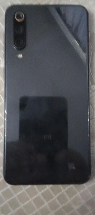 Xiaomi Mi 9 SE, 64 ГБ