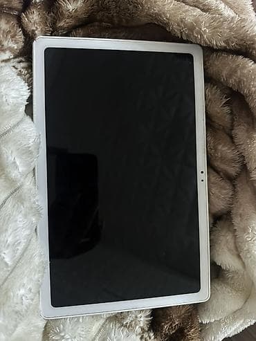 tablet sat: Samsung Galaxy Tab A7 64gb planşet Qutusu var,arxasında yungul xırda — 1