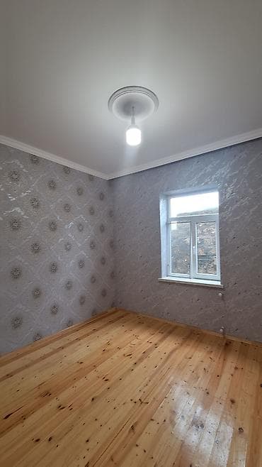 Daşınmaz əmlak: 3 otaqlı mənzil – geniş zal, iki yataq otağı və ayrı mətbəx — 2