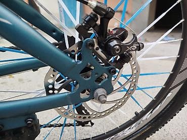 velosiped ural: Dağ velosipedi – 24” təkərlər, enli protektorlu şinlər. Rəng: tünd — 8