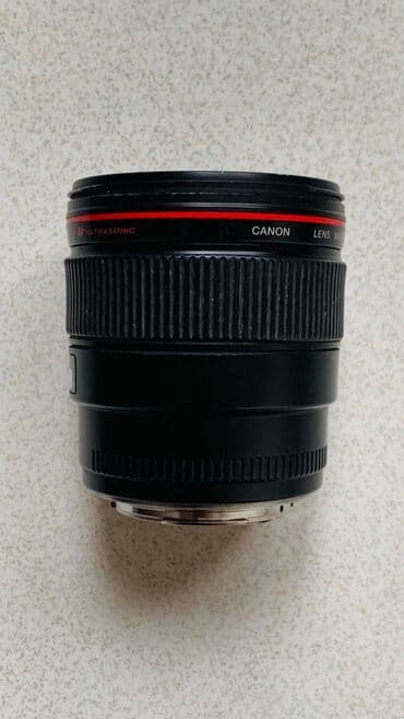 printer satisi islenmis: Canon EF 35mm f/1.4 L USM
Tam ishlek veziyetde, ciziqlari var — 5