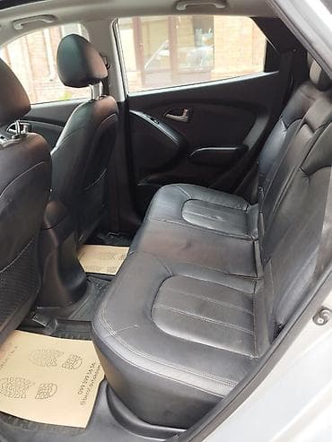 kia caren 2012: Hyundai ix35: 2 l | 2011 il Krossover — 10