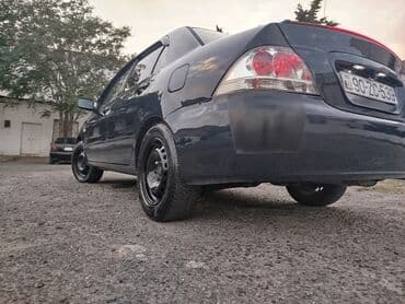 turbo az 06 lar: Mitsubishi Lancer: 1.3 l | 2006 il 300000 km — 9