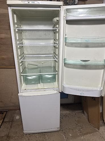 yeni soyuducu: İşlənmiş 2 qapılı Stinol Soyuducu Satılır, rəng - Ağ, Təkərli — 1