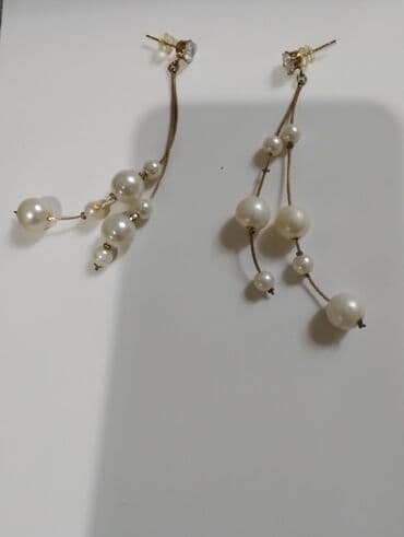 qaqa dəsti: Zərgərlik dəsti – klassik və zərif üslub - Komplekt tərkibi: - Uzun — 4