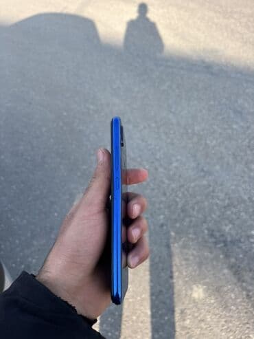 TV və video: Xiaomi Redmi smartfon Heç bir problemi yoxdur şəkildə göründüyü — 4