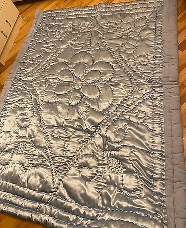 Gəncə yorğanı.Gəncədə sırınıb təzədir.2 ədəddir tək nəfərlik(qiymət 1