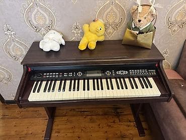 Ritmika elektron pianino/klaviş – taxta korpuslu konsol tipli model