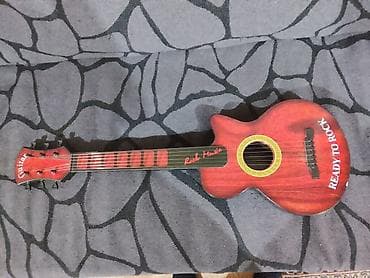 Uşaq üçün oyuncaq gitara - Dizayn: Klassik akustik forma