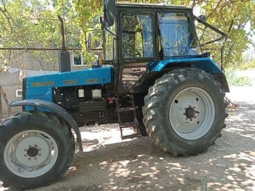 şin və disk: Mavi rəngli Belarus 1025.2 markalı traktor kənd təsərrüfatı və digər — 2