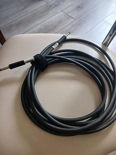 gitara simi: Məhsul: 1/4" (6.35 mm) TS – TS alət kabeli Təsvir: - Gitara, bas — 1
