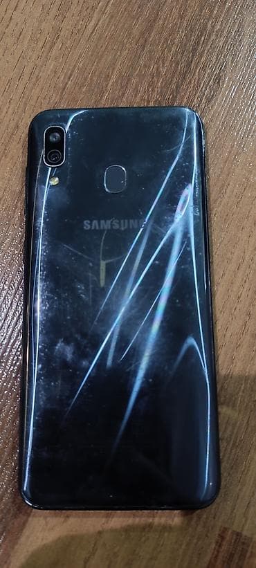 Samsung Galaxy A20, 64 GB, rəng - Qara, Qırıq, Barmaq izi, İki sim kartlı