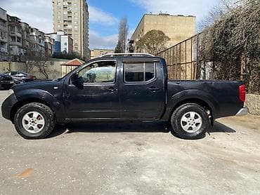 Nissan Navara: 2.5 л | 2012 г. Пикап — 8