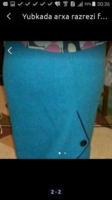 ciddi qadın ətəkləri: Qadın yubkası – tünd firuzəyi (mavi) rəngdə, düz/qələm kəsimi. - Belə — 1