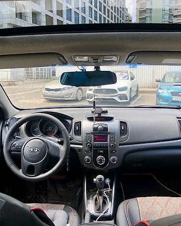 disk qabi: Kia Cerato: 1.6 l | 2011 il Sedan — 10