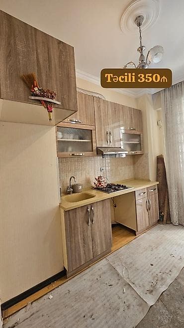 Mətbəx mebeli satılır 350₼.üzəri tökmə mərmərdir. Ölçü 2.50. üzərində