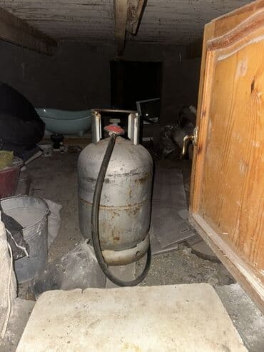 Məişət tipli qaz balonu - Həcm: təxminən 27–50 litr (standart məişət