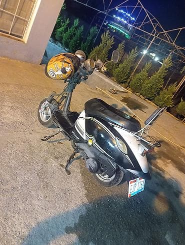 debilqe satisi: Şəhər içi rahat gediş üçün kompakt skuter/moped. Əsas xüsusiyyətlər — 3