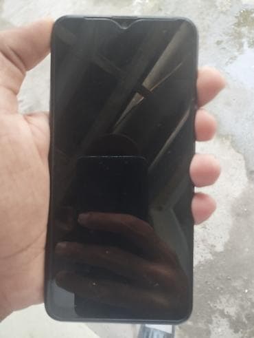 Samsung Galaxy A20, цвет - Черный, Отпечаток пальца — 1