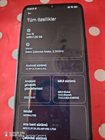 muzukalni centir: Redmi 9, 64 GB — 5