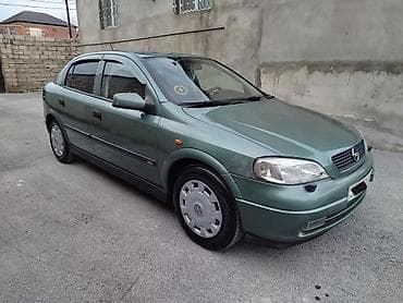 formula tekerler: Opel Astra: 1.8 l | 1999 il 250000 km Sedan — 5