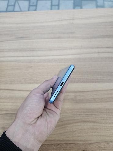 ТВ и видео: Poco X5 5G, 256 ГБ, цвет - Голубой, Отпечаток пальца — 5