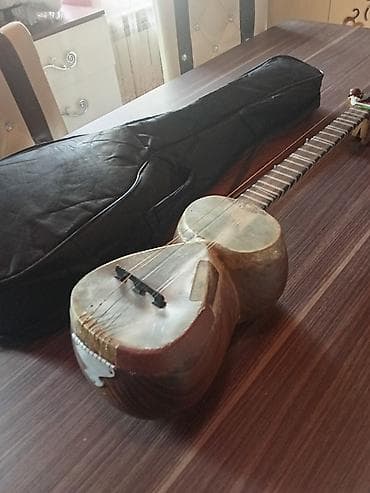 tar instrument: Tar – klassik Azərbaycan musiqi aləti, yumru gövdəli, dəri ilə örtülü — 3