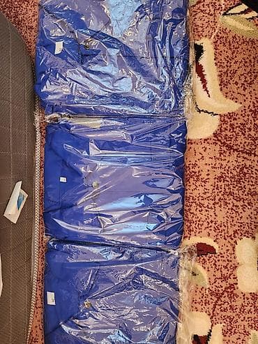 canta modelləri: Mavi rəngli kişi kostyumu – paketlənmiş halda. mavi kamizonlar 35 — 7