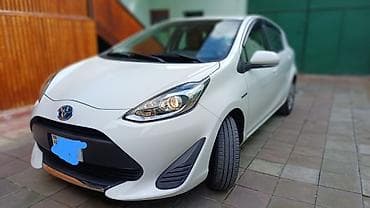 06 masin sekilleri: Toyota Aqua: 1.5 l | 2019 il Hetçbek — 6