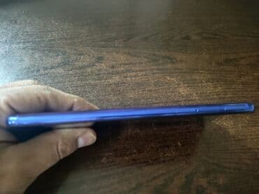 BYD: Xiaomi Mi 9 Lite, rəng - Mavi, 
 Barmaq izi — 2